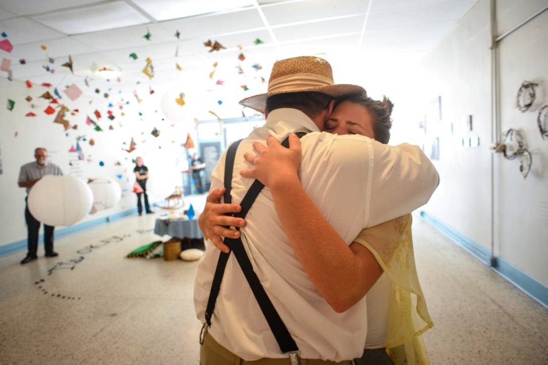 Hinge Artists Residency installation, a photo of two people hugging