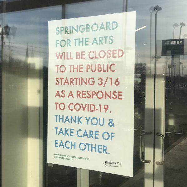 Office closure sign on Springboard for the Arts' office door