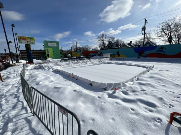 A wide angle photo of the mini ice rink located at Springboard for the Arts in Saint Paul, Minnesota.