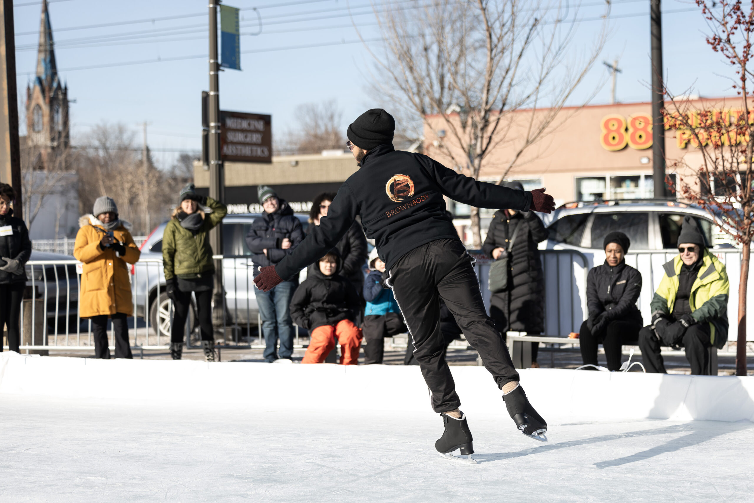 A figure skater from Brownbody performs at Springboard on Ice, 2024.